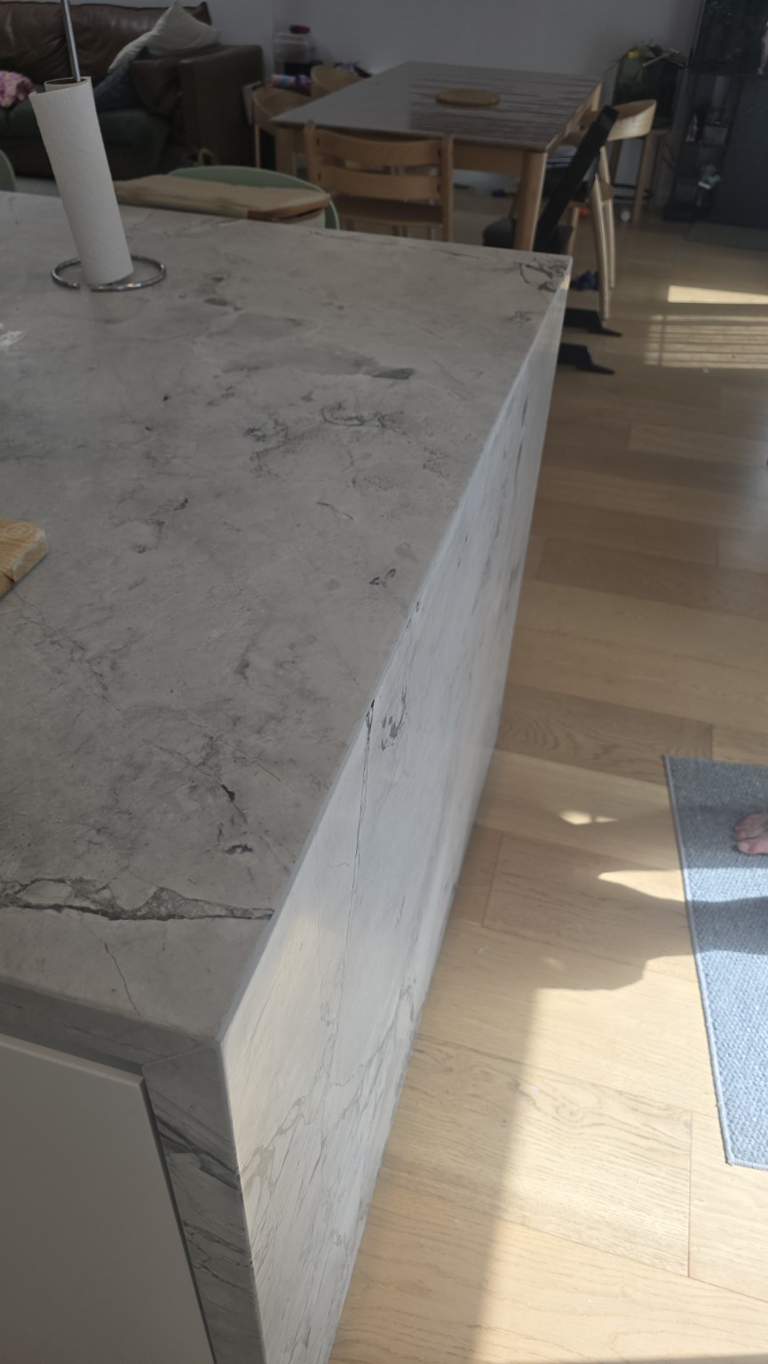 After repair: filled mitred joint along the Super White dolomite waterfall in East Lindfield